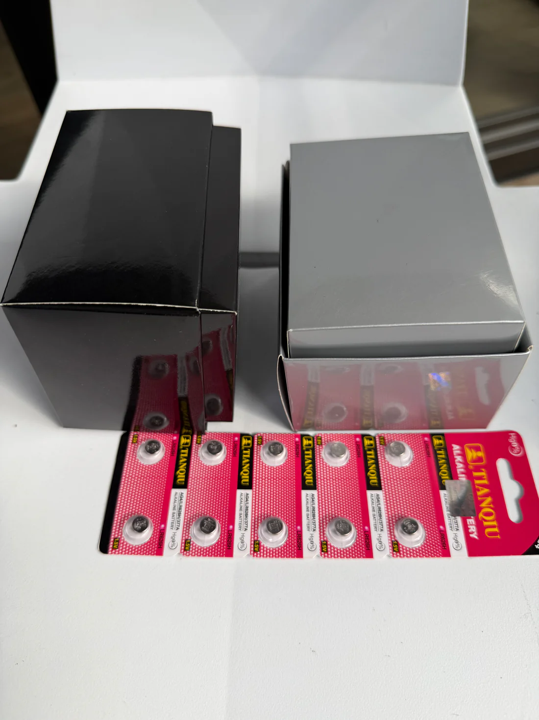 1  caja de presentación y 1  pila de repuesto